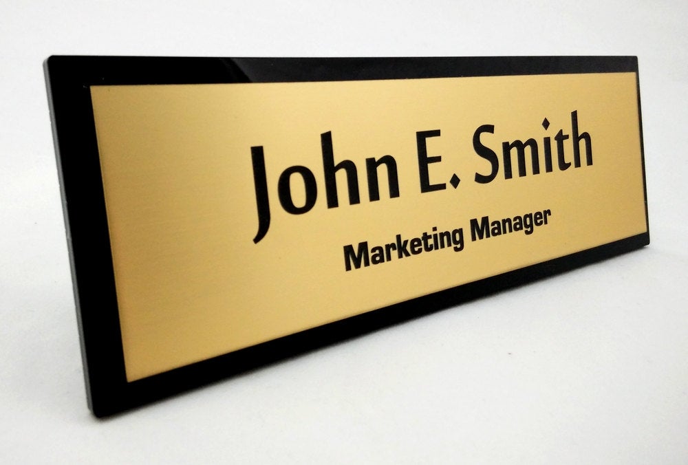 Personalised Acrylic Name Plate with brushed brass effect.