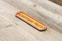 Load image into Gallery viewer, Your own Text, Custom Door Sign. 12 inch wide. Covered with powdered brass.