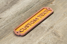 Load image into Gallery viewer, Your own Text, Custom Door Sign. 12 inch wide. Covered with powdered brass.
