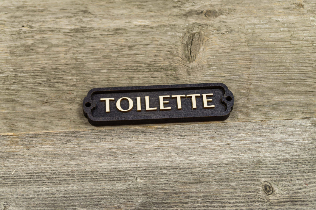 Toilette door sign
