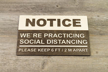 Załaduj obraz do przeglądarki galerii, We are practicing Social Distancing Sign
