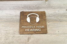 Load image into Gallery viewer, Wear Hearing Protection. Safety Ear Muffs sign.
