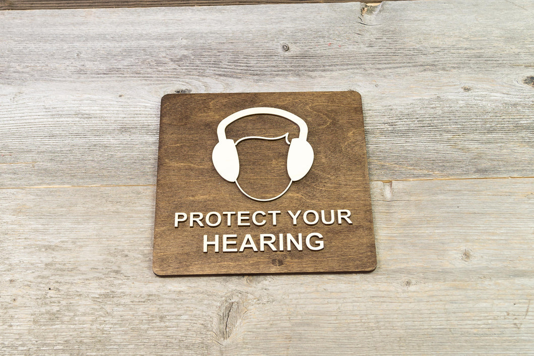 Wear Hearing Protection. Safety Ear Muffs sign.