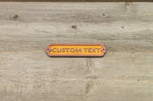 Załaduj obraz do przeglądarki galerii, Your own Text, Custom Door Sign. 12 inch wide. Covered with powdered brass.
